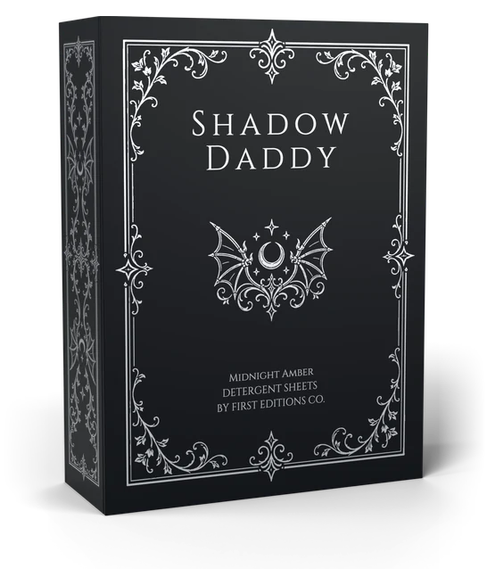 Shadow Daddy Midnight Amber laundry detergent sheets in the black refillable hardcover